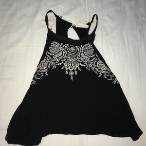 Floral black cropped tank, okay condition